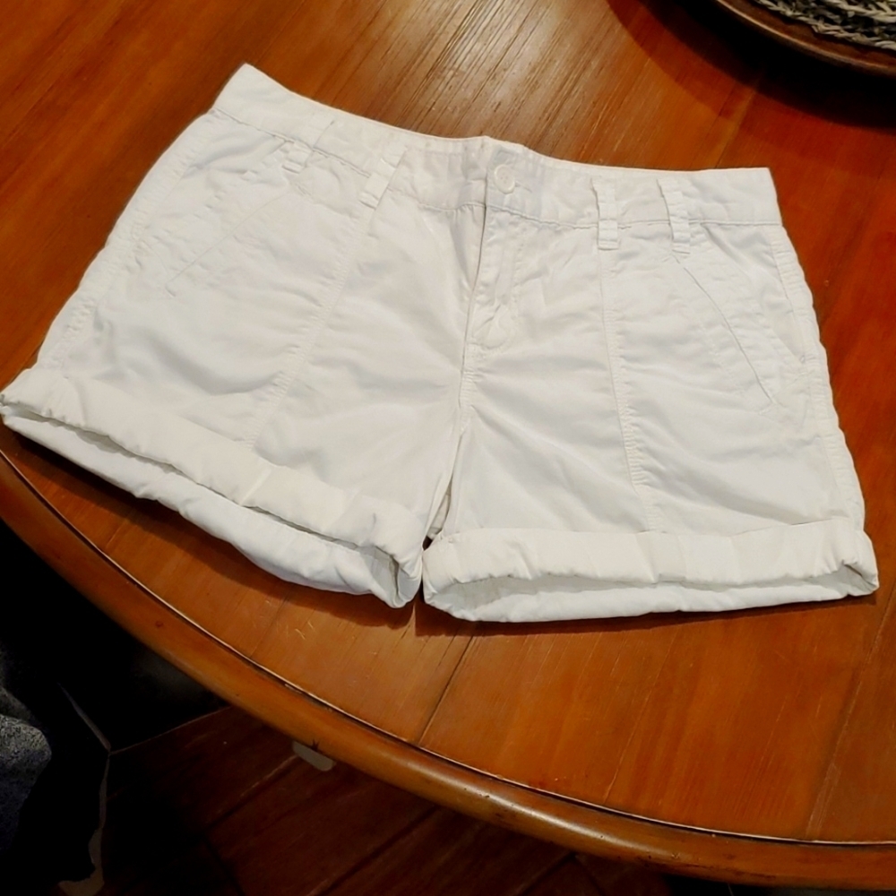 Calvin Klein White cuffed shorts.